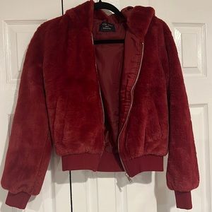 Red fuzzy bomber jacket